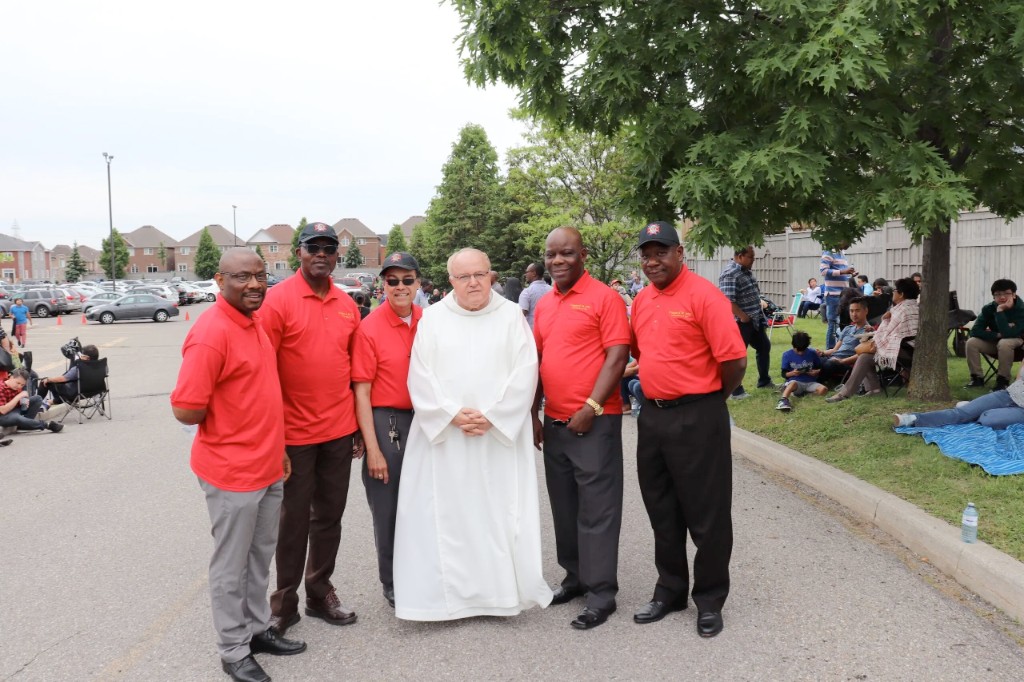 Knights with chaplain at a community gathering — moral, mental, and social formation